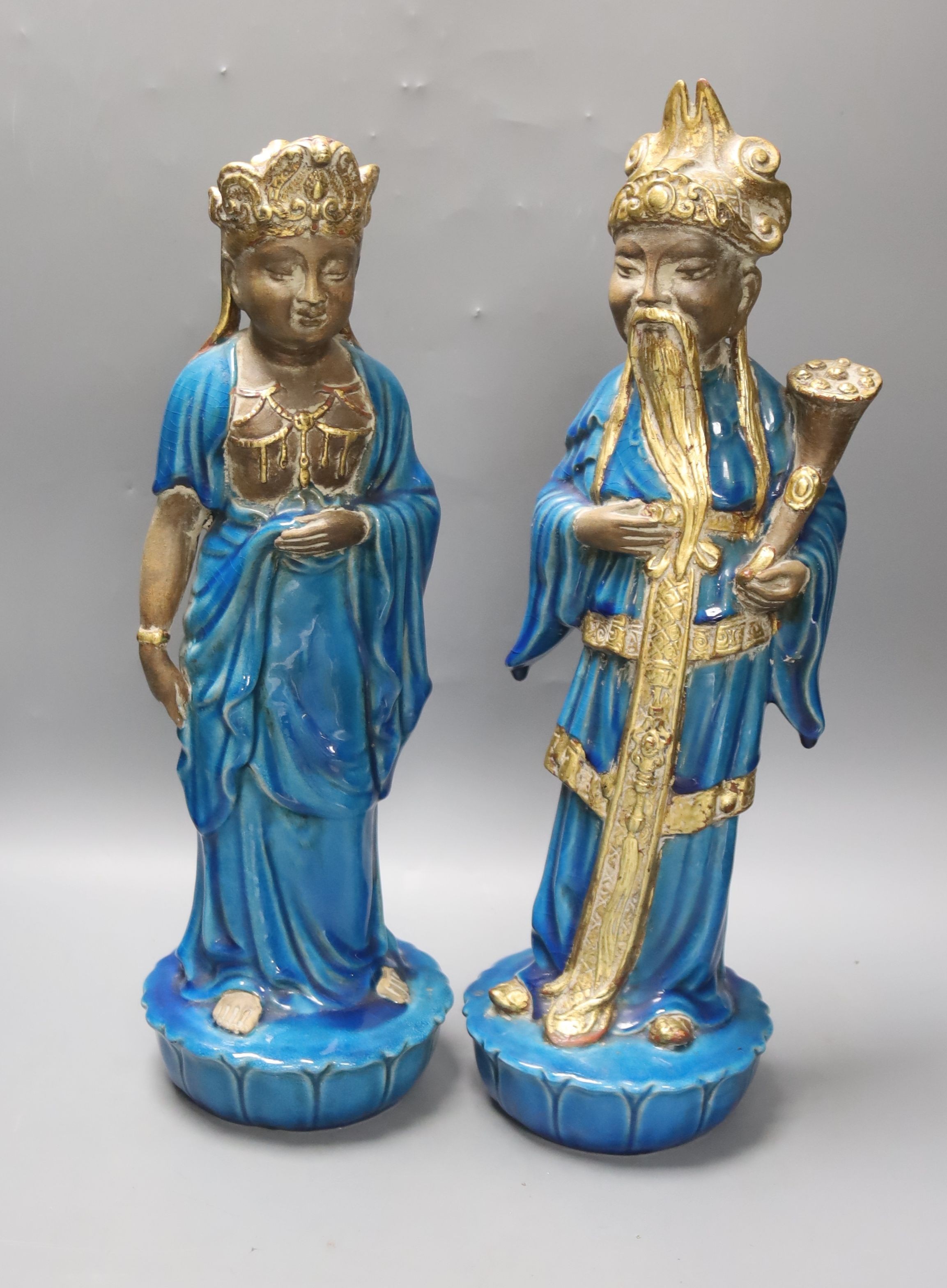 Ugo Urbano Zaccagnini, Florence, Italy, a pair of gilded turquoise glazed ceramic Oriental figures, circa 1950's, signed to base, 44cm high